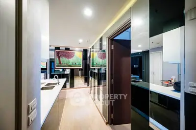 Modern kitchen with sleek design and open layout in luxury apartment