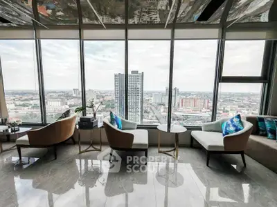 Luxurious high-rise living room with panoramic city views and elegant seating area.