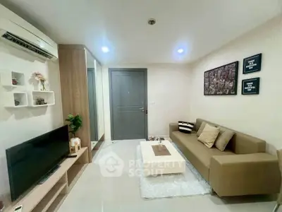 Modern living room with sleek furniture and stylish decor in a cozy apartment.