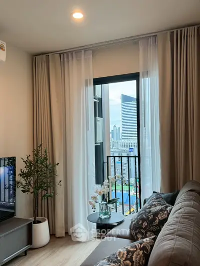 Chic living room with balcony view in modern apartment