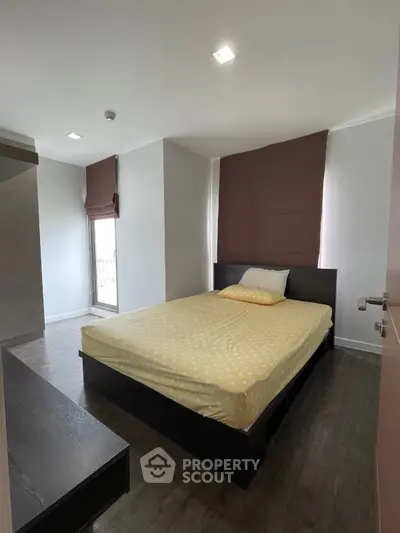 Cozy bedroom with modern decor and natural light
