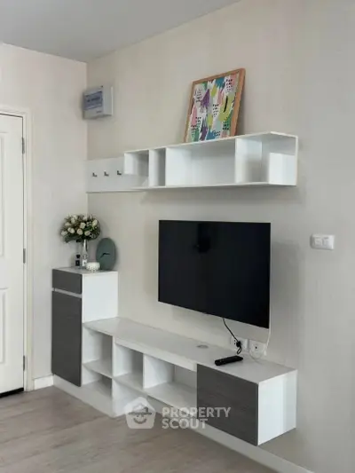 Modern living room with sleek TV unit and stylish decor