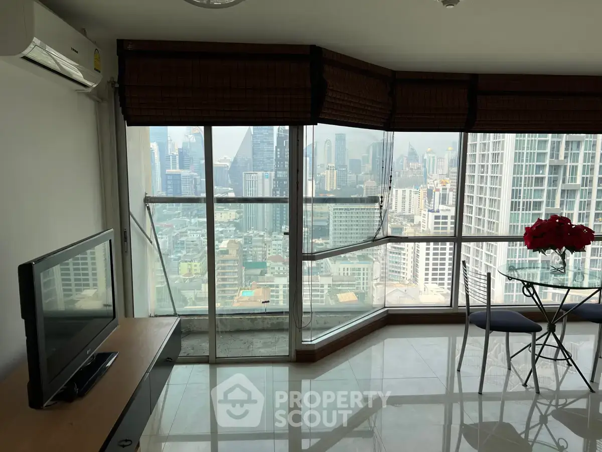 Stunning high-rise apartment with panoramic city views and modern interior design.