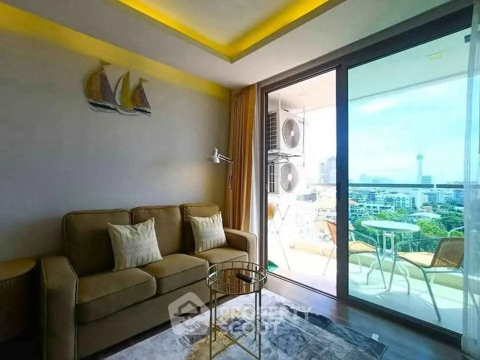 Modern living room with balcony view in high-rise apartment