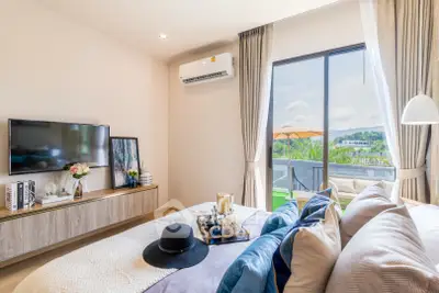 Luxurious bedroom with balcony view and modern decor