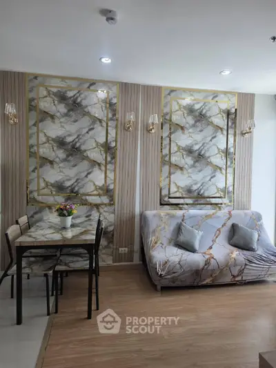Stylish living room with marble accent wall and cozy dining area, perfect for modern urban living.