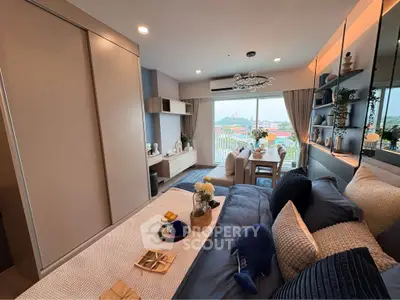 Luxurious bedroom with modern decor and stunning city view, perfect for urban living.
