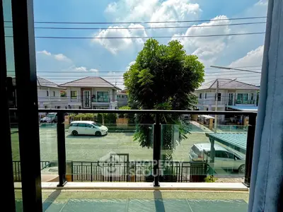 Scenic balcony view with modern houses and clear blue sky
