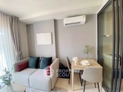 Modern living room with cozy sofa, dining table, and air conditioning in stylish apartment.