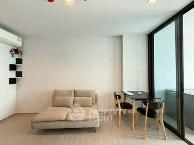 Modern living room with cozy sofa and dining area in a stylish apartment