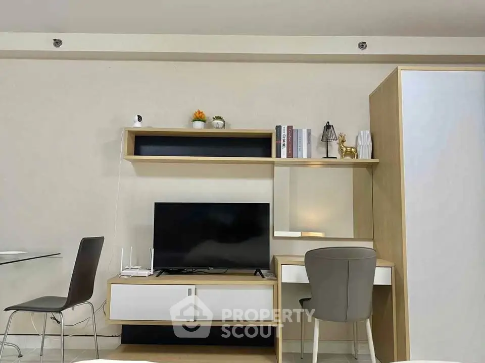 Modern living room with sleek TV unit and stylish decor