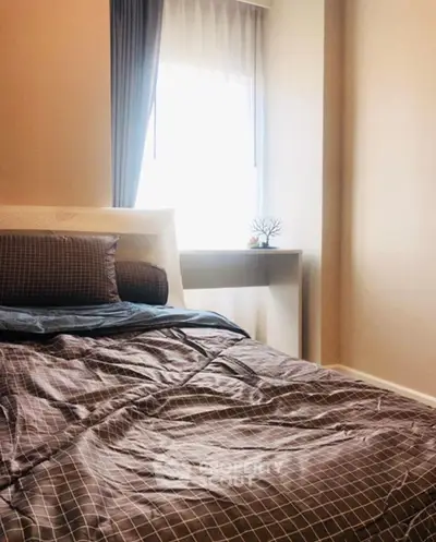 Cozy bedroom with natural light and modern decor