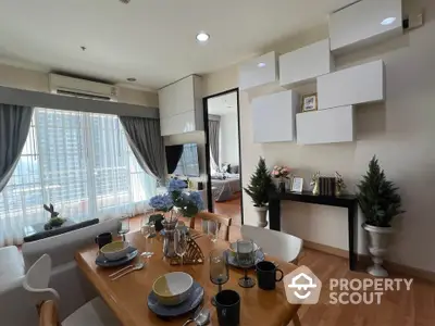 Modern apartment dining area with stylish decor and natural light