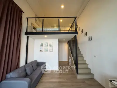 Modern loft apartment with mezzanine bedroom and stylish living area