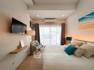 Modern bedroom with cozy decor and natural light