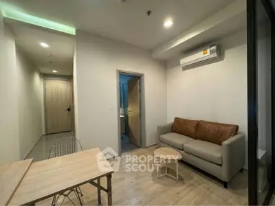 Modern living room with cozy sofa and air conditioning in a stylish apartment