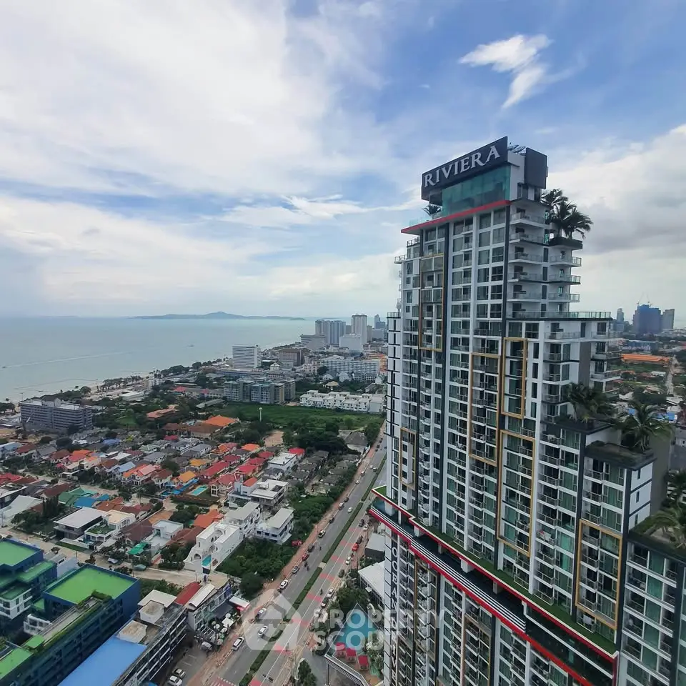 Stunning high-rise building with ocean view in vibrant cityscape