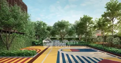 Stunning outdoor basketball court surrounded by lush greenery in a modern residential complex.