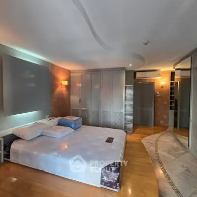 Luxurious bedroom with modern design and ample closet space
