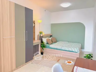 Modern bedroom with stylish decor and cozy ambiance, featuring a comfortable bed and ample storage space.