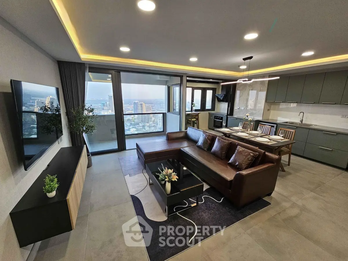 Luxurious modern living room with stunning city view and open kitchen layout