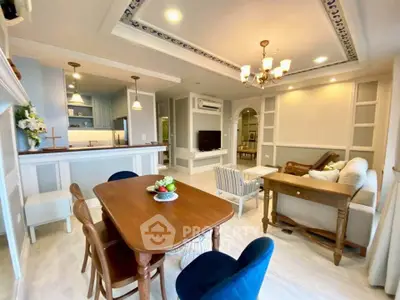 Elegant open-plan living room with dining area and stylish decor