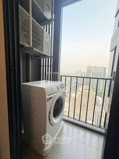 Modern high-rise balcony with washing machine and city view, perfect for urban living convenience.