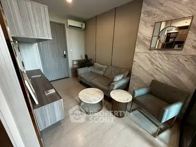 Modern living room with stylish furniture and elegant decor in a contemporary apartment.