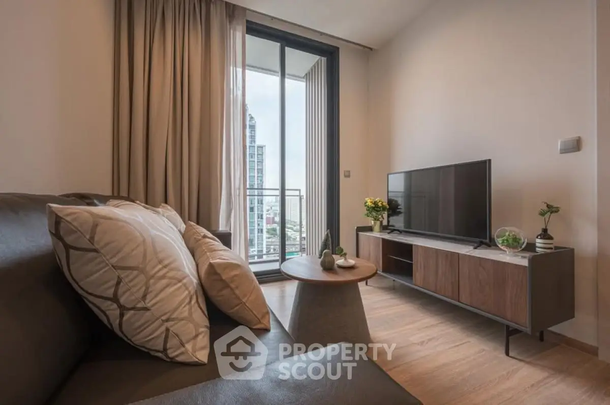 Modern living room with balcony view and stylish furniture