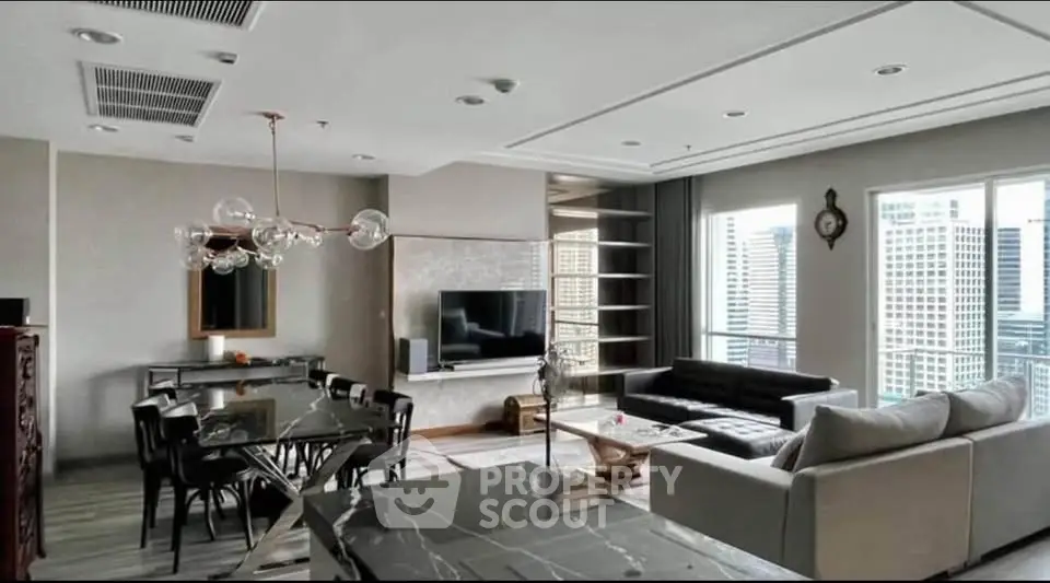 Luxurious modern living room with city view, elegant furniture, and stylish lighting.