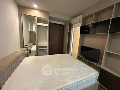 Modern bedroom with built-in storage and sleek design, perfect for urban living.