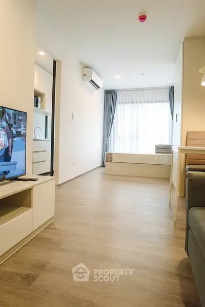Modern studio apartment with open layout and natural light