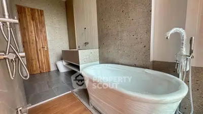 Luxurious bathroom with elegant freestanding bathtub and modern fixtures