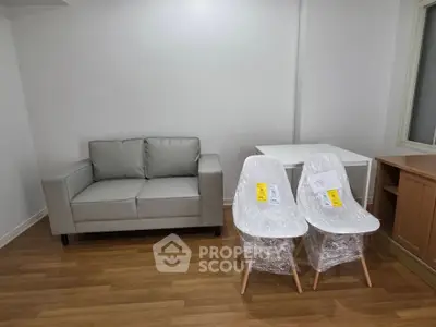 Modern living room with new furniture and wooden flooring