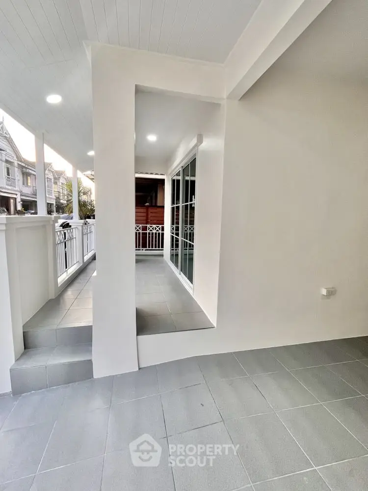 Modern balcony with sleek design and spacious layout in a contemporary home.