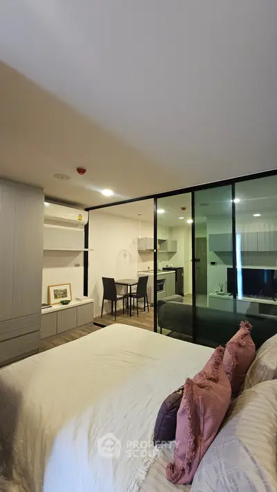 Modern studio apartment with open layout and stylish furnishings