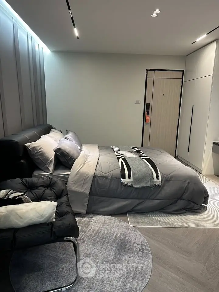 Modern bedroom with stylish decor and cozy ambiance