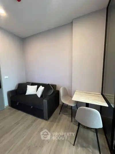 Modern living room with sleek furniture and stylish decor