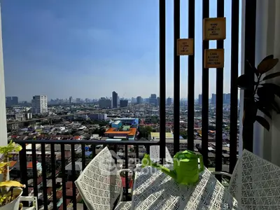 Stunning city view from modern balcony with stylish furniture and lush greenery