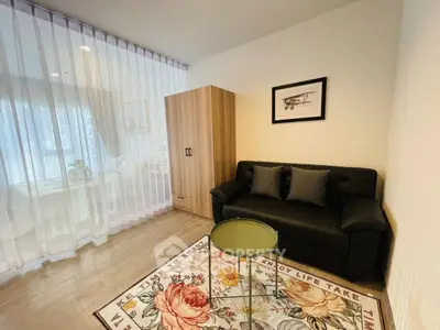 Cozy living room with stylish decor and natural light