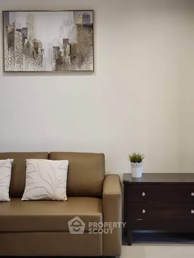 Modern living room with stylish sofa and elegant wall art