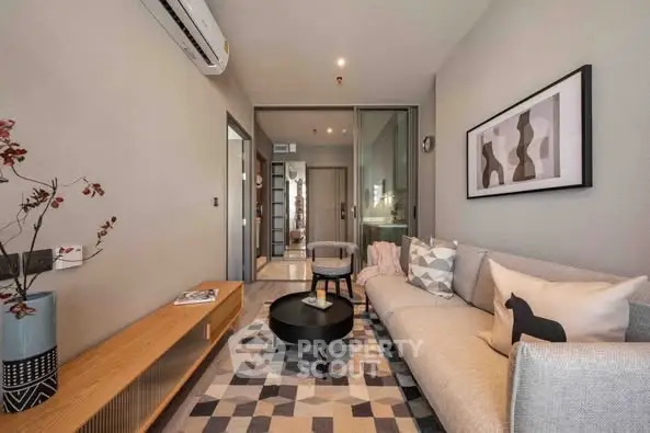 Modern living room with stylish decor and cozy seating area.