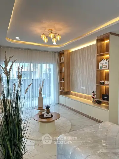 Luxurious modern living room with elegant lighting and stylish decor