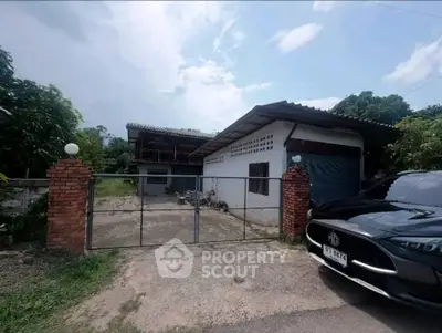 Charming rural property with spacious yard and gated entrance, perfect for serene living.
