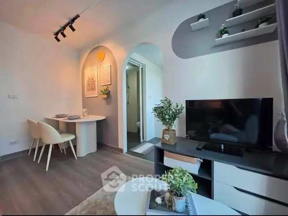 Charming modern living room with stylish decor and cozy dining area, perfect for urban living.
