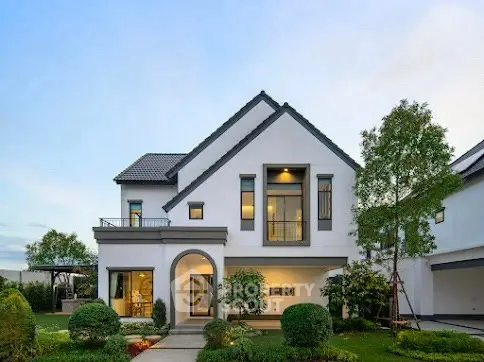 Elegant modern house with manicured garden and stylish architecture