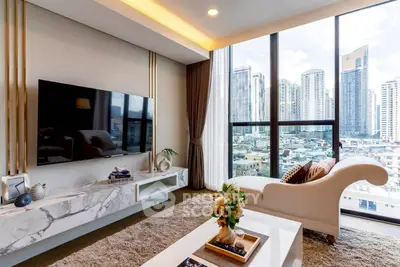 Luxurious living room with city view, modern decor, and elegant furniture in high-rise apartment.