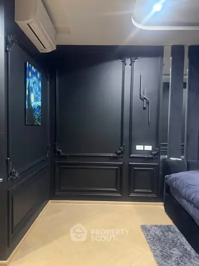 Luxurious modern bedroom with elegant black paneling and stylish decor