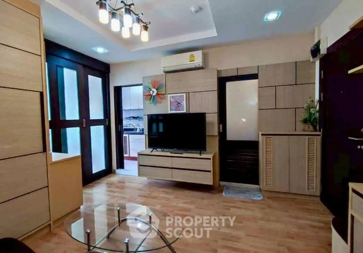 Modern living room with stylish decor and open kitchen view