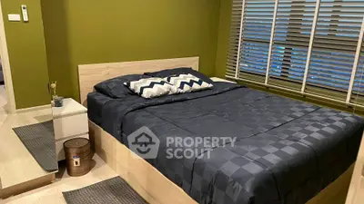 Modern bedroom with stylish decor and cozy ambiance.